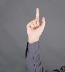 Hand reaching forefinger close-up