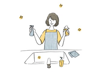 台所のシンクを掃除する女性