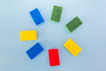 colored washcloths on a blue background.