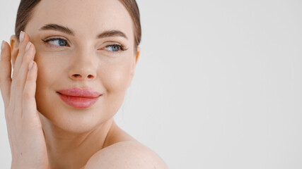 Beautiful woman clean skin healthy beauty face close up natural make up isolate don white natural 