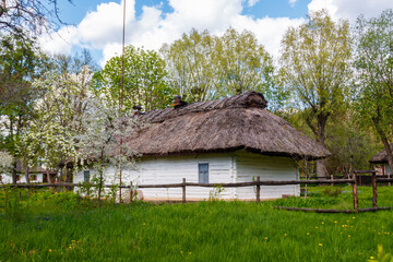 Fototapeta na wymiar Ancient traditional ukrainian rural house in Open air Museum of Folk Architecture and Folkways of Middle Naddnipryanschina in Pereyaslav, Ukraine