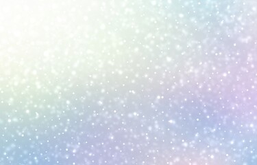 Snow falling on pastel blue pink ombre glowing background. Light winter blurred texture.