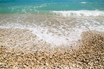 Blue sea in Cap Negret beach in Altea