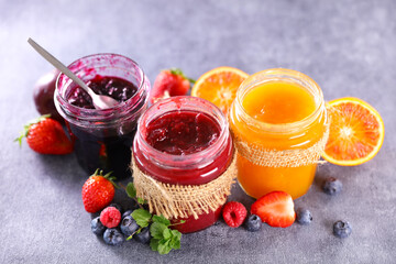 assortment of jams and fresh fruits