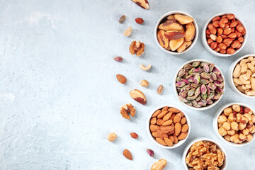 Nuts assortment with copy space, shot from above. Pistachios, Brazil nuts, almonds etc