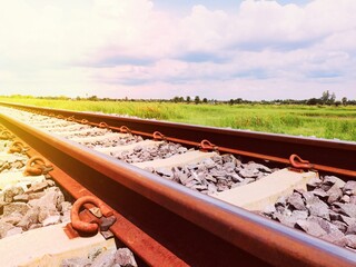 An old railroad, the route of travel when the sun goes down and sees nature and the sky.