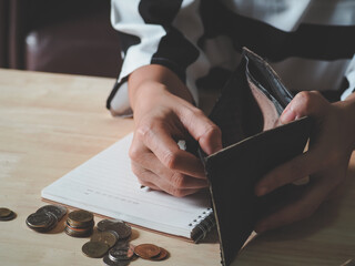 bankruptcy economic financial concept. Person open his empty wallet without money to pay debt in...