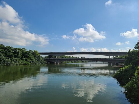 Bridge On Reflective River Sunny Sky, Sengkang Floating Wetland, Singapore