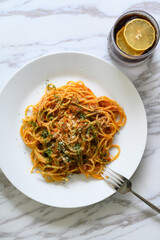 Pasta and lemonade on the table