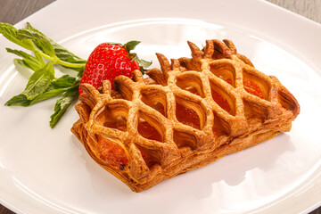 Sweet puff pastry served strawberry