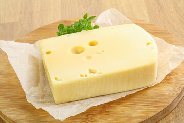 Maasdam cheese over the board