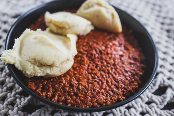 vegan lentil cottage pie with mash potato topping getting prepared, healthy plant-based food