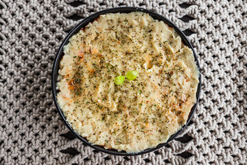 vegan lentil cottage pie with mash potato topping before going in the oven, healthy plant-based food