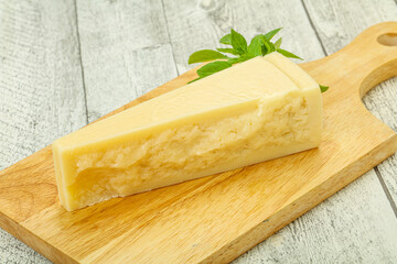 Hard parmesan cheese served basil