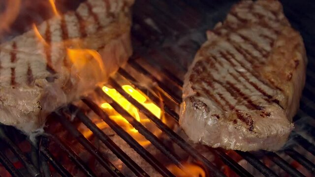 BBQ steack on grill. Grilling on fire meat