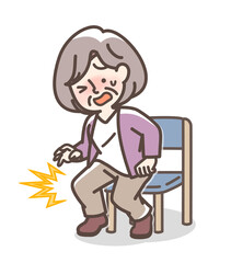 立ちあがる時に膝が痛むおばあさん