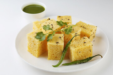 Gujarati Khaman Dhokla made using Chana Dal, served with Green chutney