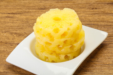 Sweet pineapple rings in the bowl