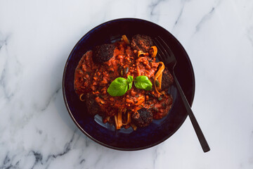 spaghetti bowl with vegan meatballs, healthy plant-based food