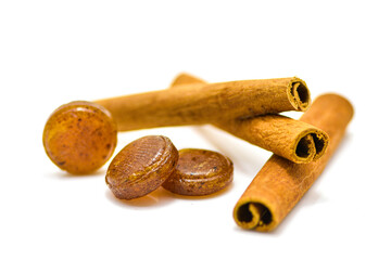 Medical green lozenges for relief cough, sore throat and throat irritation isolated on white background.