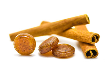 Medical green lozenges for relief cough, sore throat and throat irritation isolated on white background.