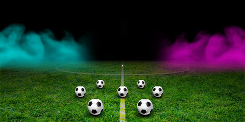 Many balls in textured soccer game field with neon fog - center position, midfield at night. Panorama 