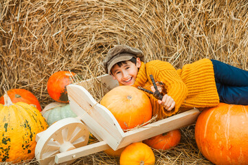 little happy boy with a slingshot.