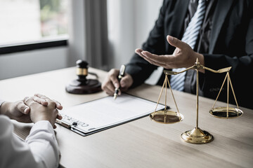 Attorneys advising in cases where a client has been defrauded by a defendant who is a business partner forming a joint company, advising on litigation and gathering evidence. Fraud case concept.