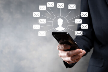 Male hand holding letter icon,email icons .Contact us by newsletter email and protect your personal...