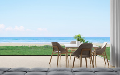 Dining table with chair set and sofa on wooden floor of dining room near living area in modern house or luxury hotel. Minimal home interior 3d rendering with sky and sea view.