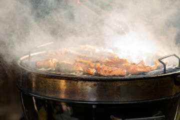 Miscellaneous delicious grilled meat over the coals on a grill