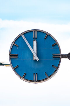 Malmo, Sweden June 12, 2021 An old landmark clock on the Kockums Shipyard reads, 11.55.