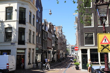 Amsterdam Street View with Traditional Buildings and People
