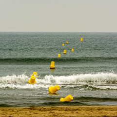 Yellow buoys in the sea, La Grande-Motte, France