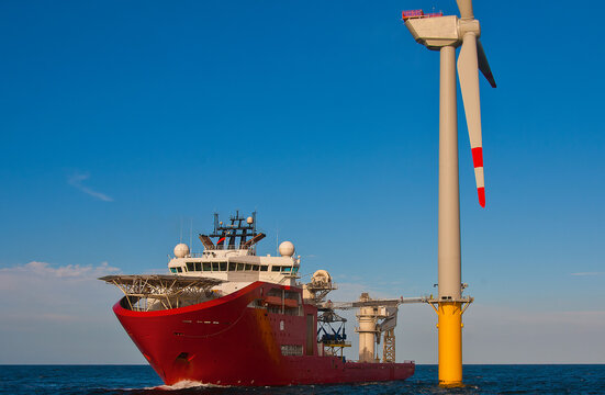 Service operational vessel with walk to work gangway deployed to offshore wind turbine