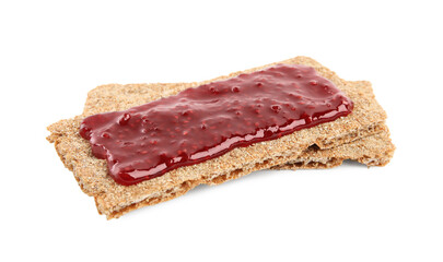 Fresh rye crispbreads with jam on white background