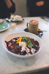 Granola bowl  & Flat White, Cafe in Auckland, New Zealand