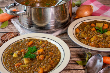 Vegetarian lentil stew served on rustic plates