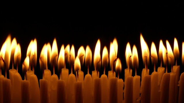 Many Candles Burning In Church
