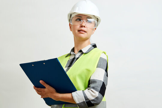 Portrait Of Female Construction Worker On White Background