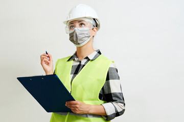 Engineer woman worker with hard hat and paper clipboard