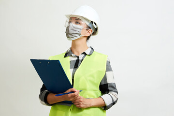 Engineer woman worker with hard hat and paper clipboard
