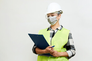 Engineer woman worker with hard hat and paper clipboard