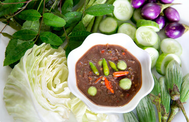 Spicy Shrimp Paste Dip (Nam Prik Kapi) in white dish Thai food
