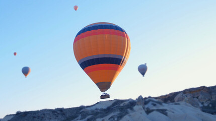 Hot air baloons preparing for take off. Famous sightseeing Cappadocia. Lights of air balloons.