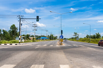 Bangkok, Thailand-June, 06, 2021: Red light intersection, view from the driver's seat on the road in Bangkok, Thailand.
