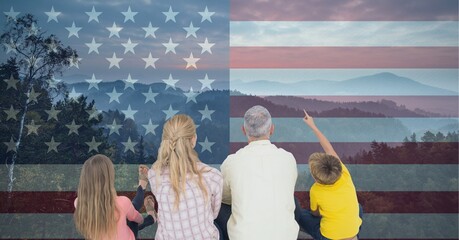 Composition of caucasian couple with son and daughter against american flag