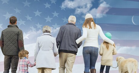 Composition of three generation family against american flag