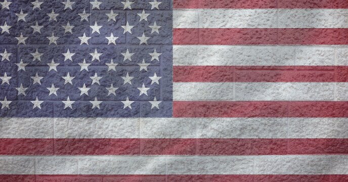 Composition of american flag over brick wall