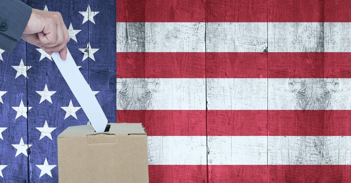 Composition of man casting vote into ballot box against american flag